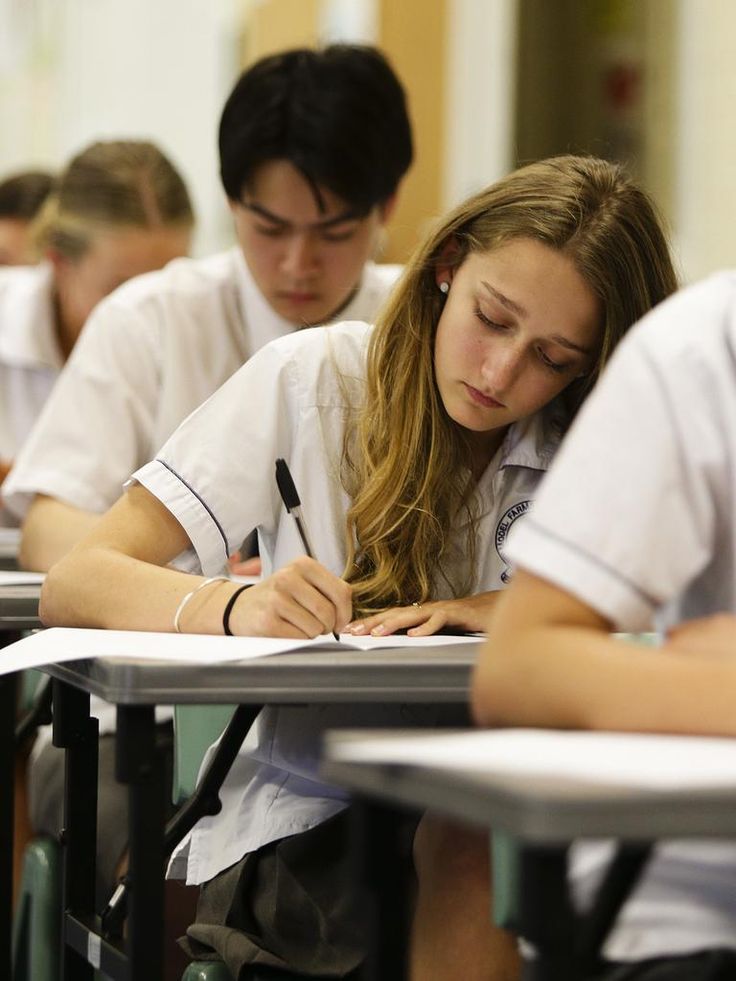 Student writing under exam conditions